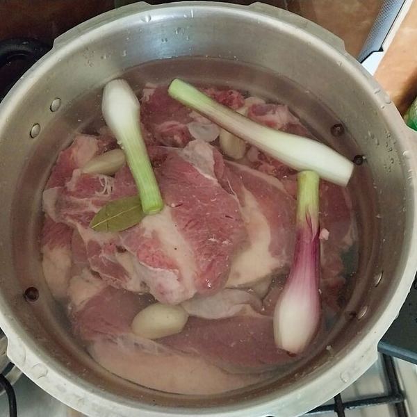 Chuck goes tender in about half an hour under pressure. Keep the pieces big, let the pressure drop on its own, and add the vegetables afterwards.