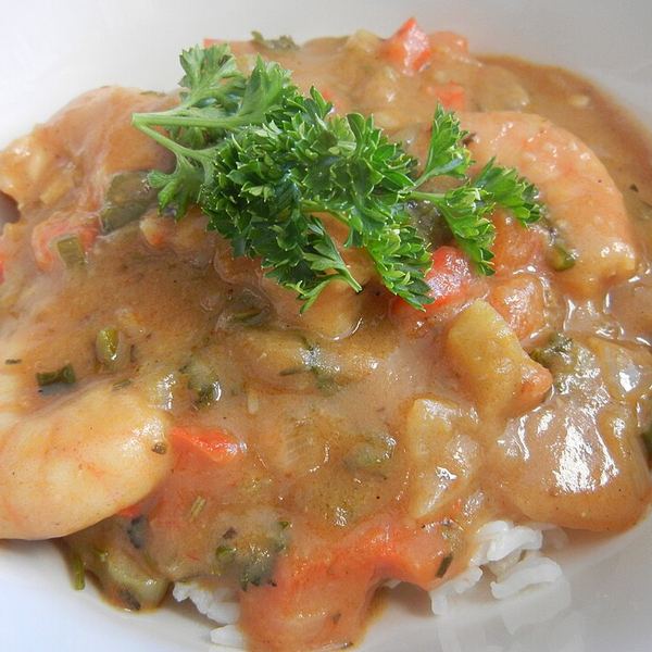 Shrimp and crab with a lighter roux and tomato in the pot. The New Orleans version, where the stock does the heavy lifting.